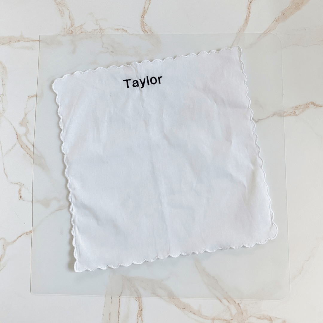 Embroider initial(s) on fabric square